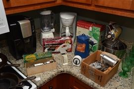 assorted kitchen appliances - Sunbeam mixer with attachments, Reed's Rocket nut cracker and more