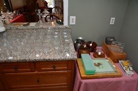 glassware, butcher block cutting board, recipe holder with recipes