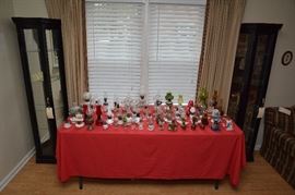 wide assortment of oil and kerosene lamps, various sizes, styles, and makers; pair lighted curio cabinets
