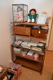 Baker's portable rack, Gebruder Heubach doll and other small doll in glass case, Cabbage Patch dolls, sewing kits, albums, assorted cards