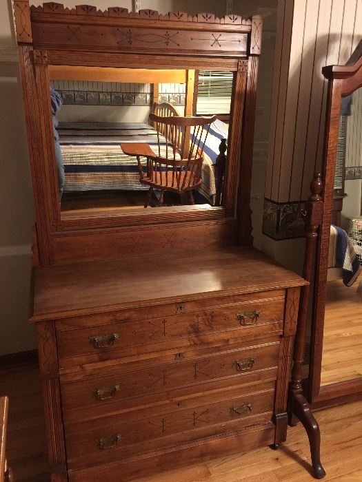 antique Eastlake dresser in great shape.  Attached tilting mirror very clear.