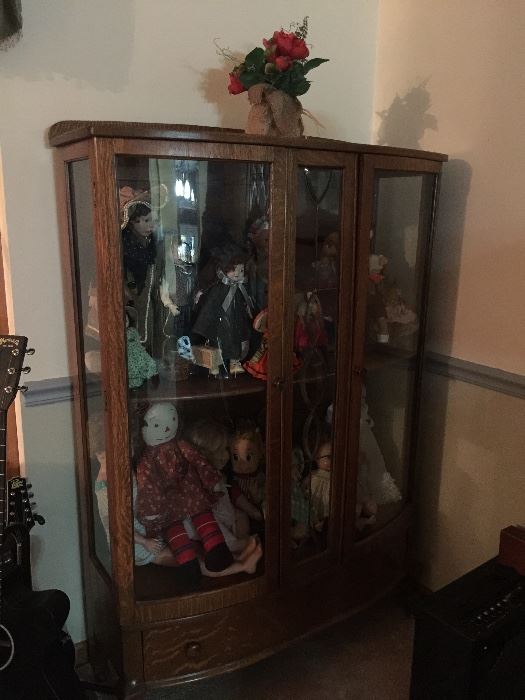 Beautiful antique curio cabinet.  Has three shelves (only one shown) and a drawer on the bottom.
