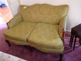  #90 yellowish loveseat on legs $75 