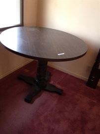 #84 round pedistal table laminate top 42x30 $50 