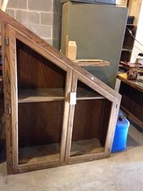 #106 Angle wood cabinet no glass in door $30 