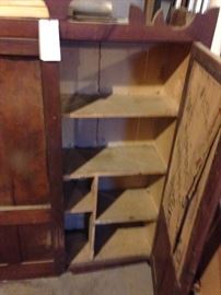 #104 wood cabinet w doors and shelves inside $75 