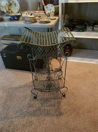 wrought iron side table or centerpiece on patio