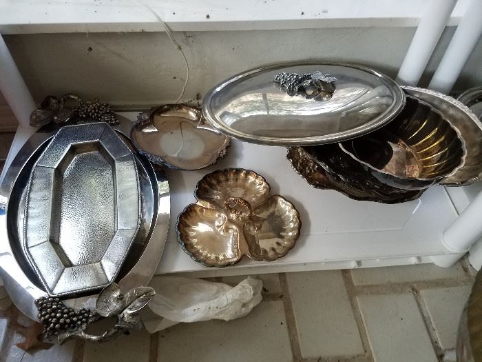 silver plated and copper dinner table items