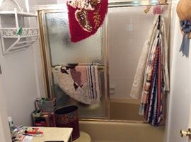 Master bathroom - miscellaneous items, rugs, shower curtains, rattan shelves etc