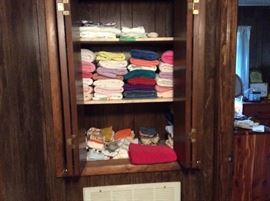 Linen closet at end of hallway - towels, hand towels, wash cloths, tablecloths, bath rugs etc.