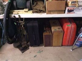 Garage - suitcases, fireplace tools