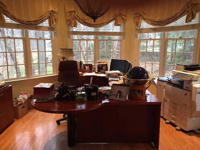 Everything and more for a home office.  Steel case U- shaped desk with additional mounted storage cupboard and bulletin board ( not shown here)  4 drawer credenza with vertical files.  Executive chair, under mount key board and mouse stand, 4 matching book shelves ( 6 feet) and Ricoh copier, scanner, printer and fax. 