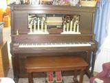 c. 1925 player piano - was restored in 1980. Needs tuning, but I believe it works - come try it out!
