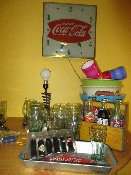 Lots of vintage Coca Cola items Including WWII era wooden 6 pack carrier and vintage bottles