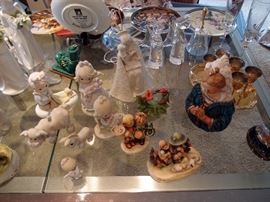 Collectibles including Precious Moments and Snow Babies.
