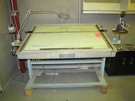 Lighted drafting table w/ lighted magnifier, tape
dispenser