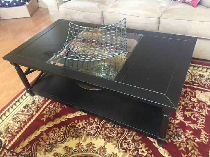 Black wood and glass coffee table with bottom shelf