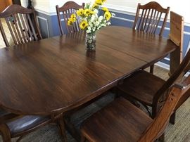 Dinning room set. Excellent condition 2 captain chairs 4 side chairs 2 inserts. Handmade Amish? Most of the furniture in this house is Amish made. SOLID. 