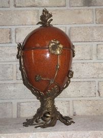 beautiful- brand new vase with lid. Bronze and porcelain. Not an imported knock off. Really amazing quality. Asking $200