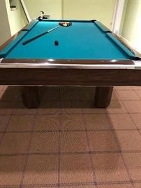 Brunswick Medalist Pool  table 4 1/2 x 9 Extremely rare table!
This table is completely restored!
It features solid walnut rails
Solid wood frame
Four  legs AND ALL AMERICAN MADE FROM 1970s!
As stated before this is a rare find indeed
For the snooker player that can't put a 6 x 12ft. table in their home but want the challenge that snooker presents or the pool enthusiast that wants to sharpen his pool game by playing on some of the most difficult tables ever created.
If interested please contact me and have this table in your home for the holidays!
