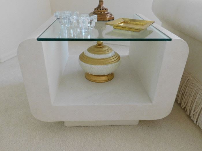 Contemporary end table with very thick glass. Display area underneath makes a great display.