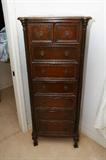 Tall French chest of the period.