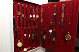 Men's watches and pocket watches. Some are gold.