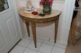 Marble top demilune of the period.