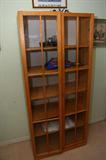 Wood shelf with doors.