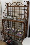 Wicker and glass display cabinet with three shelves