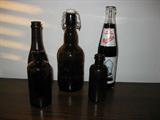 one of these bottles is from the Oriole world series commemoration one bottle has a ceramic stopper