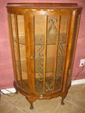 English cabinet, circa 1930, walnut fully glazed, glass fitted shelves, decorated glass base, very unusual sliding door.