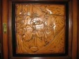 Wall unit hand carving on cabinet front - right