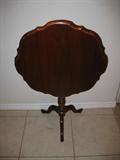 one of two drop leaf tables with the leaf up