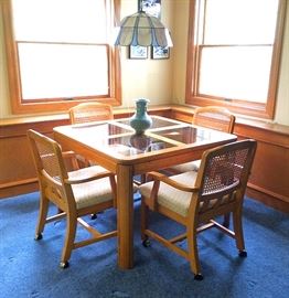 Semi-Vintage Glass & Wood Table with Cane Back Rolling Chairs