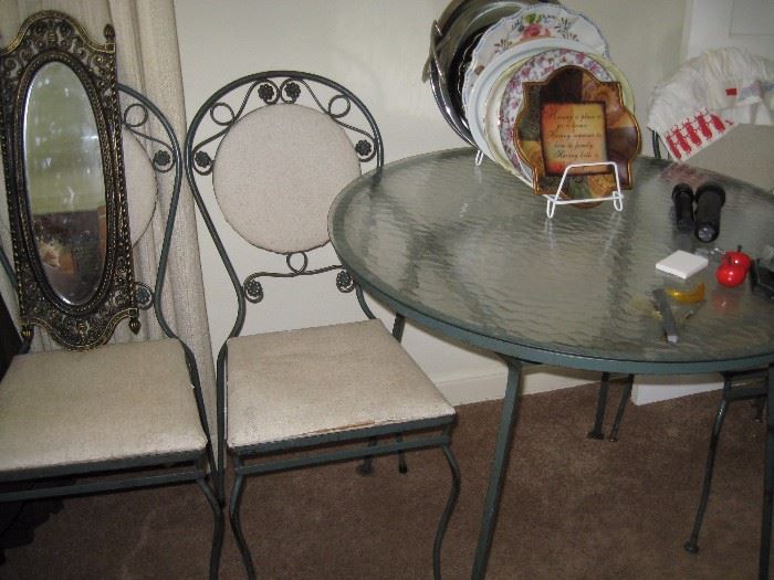 Round glass top table with chairs