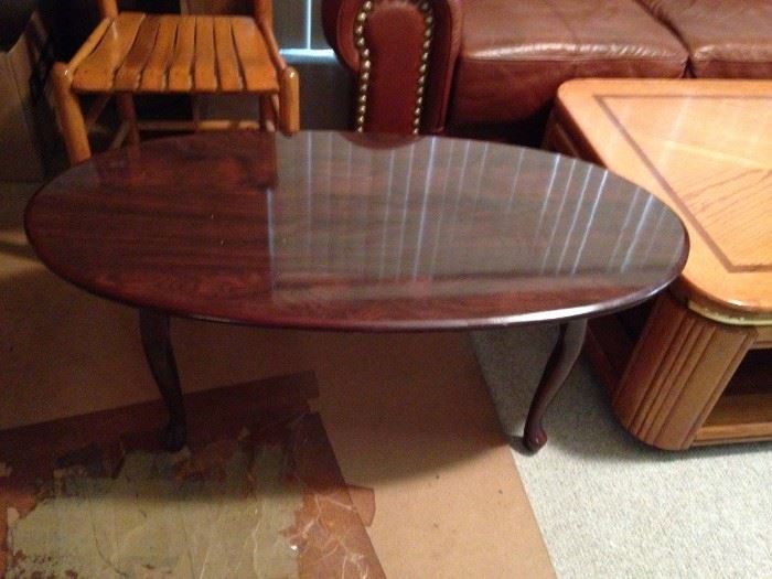 #41 oval coffee table cherry look $50
#18 (2) old odd dining chair w. wood slated $30 each
#38 brown leather sofa 86" long $500