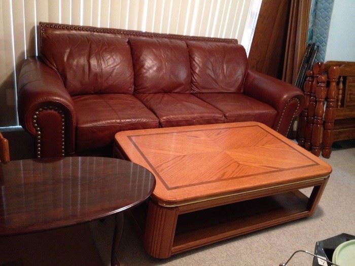 #41 oval coffee table cherry look $50
#38 brown leather sofa 86" long $500                          #30 coffee table  $75