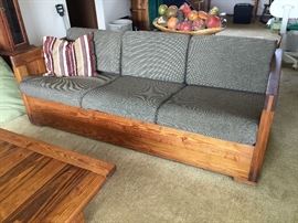 Well made couch. Has interchangeable cushions and padded armrests. Other cushions not photographed