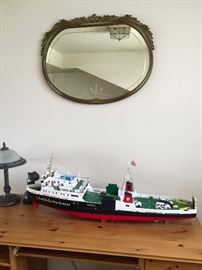 Panel in ship lifts to reveal motor. 