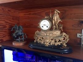 Clock from the 1880s. Statue on left has been repaired 