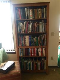 Good bookcase filled with war books, New Orleans, Elvis, cookbooks and more