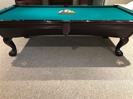 9Ft x 5 Ft Brunswick Pool Table with Brunswick Rack and Many Cue Sticks