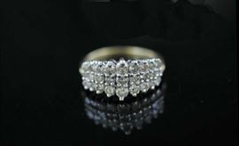 Lot 9: 14k white gold and diamond cocktail ring, set with 27 diamonds, approx. 2ctw