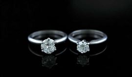 Lot 14: Two "900" platinum diamond rings