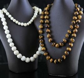 Lot 17: 32" cat's eye bead necklace with 30" ivory