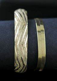 Lot 21: Two 14k yellow gold bracelets, approx. 15.1 grams