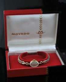 Lot 26: 14k gold ladies Movado watch in box