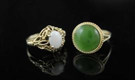 Lot 37: 14k gold jade ring with a gold opal ring