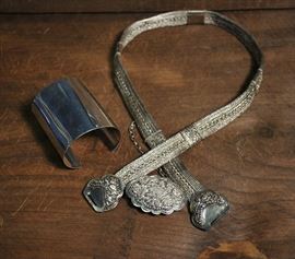 Lot 39: 30" silver belt with buckle along with a large sterling cuff bracelet, 12 Toz